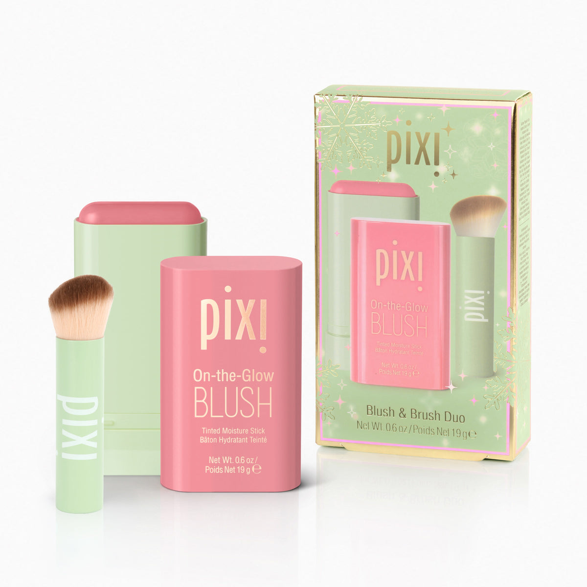 Pixi On-the-Glow Blush Blush Hydrating Stick and Brush Duo set, featuring a pink blush stick, a mint green brush, and a matching mint green and pink box on a white background.