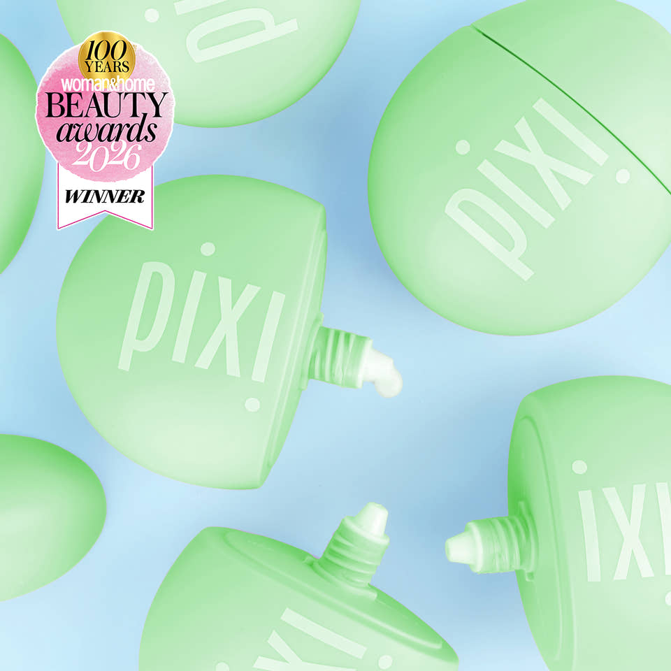 Pixi HandHero bottles in a pastel mint green color scattered on a light blue background, with a pink and gold 100 Years to Beauty Awards 2026 Winner badge in the top left corner. view 1