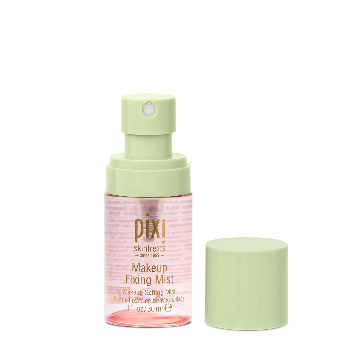 Pixi Skintreats Makeup Fixing Mist in a clear bottle with a pale green spray pump, shown next to its matching light green cap on a white background.