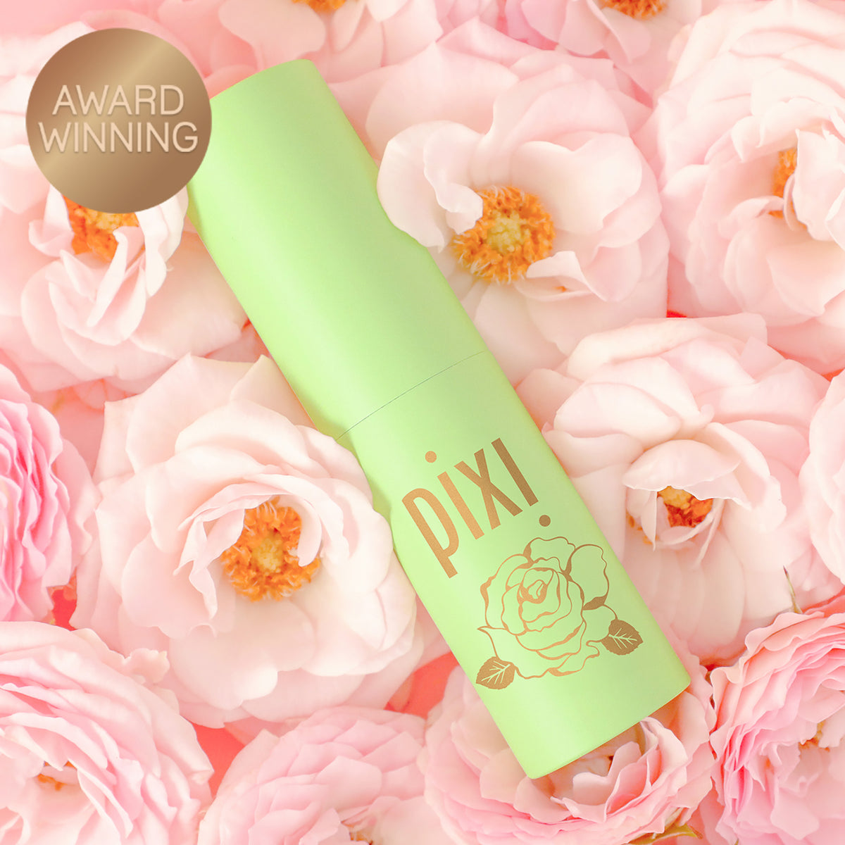 Award Winning: PixiPerfume Rose shown on a pink background with roses