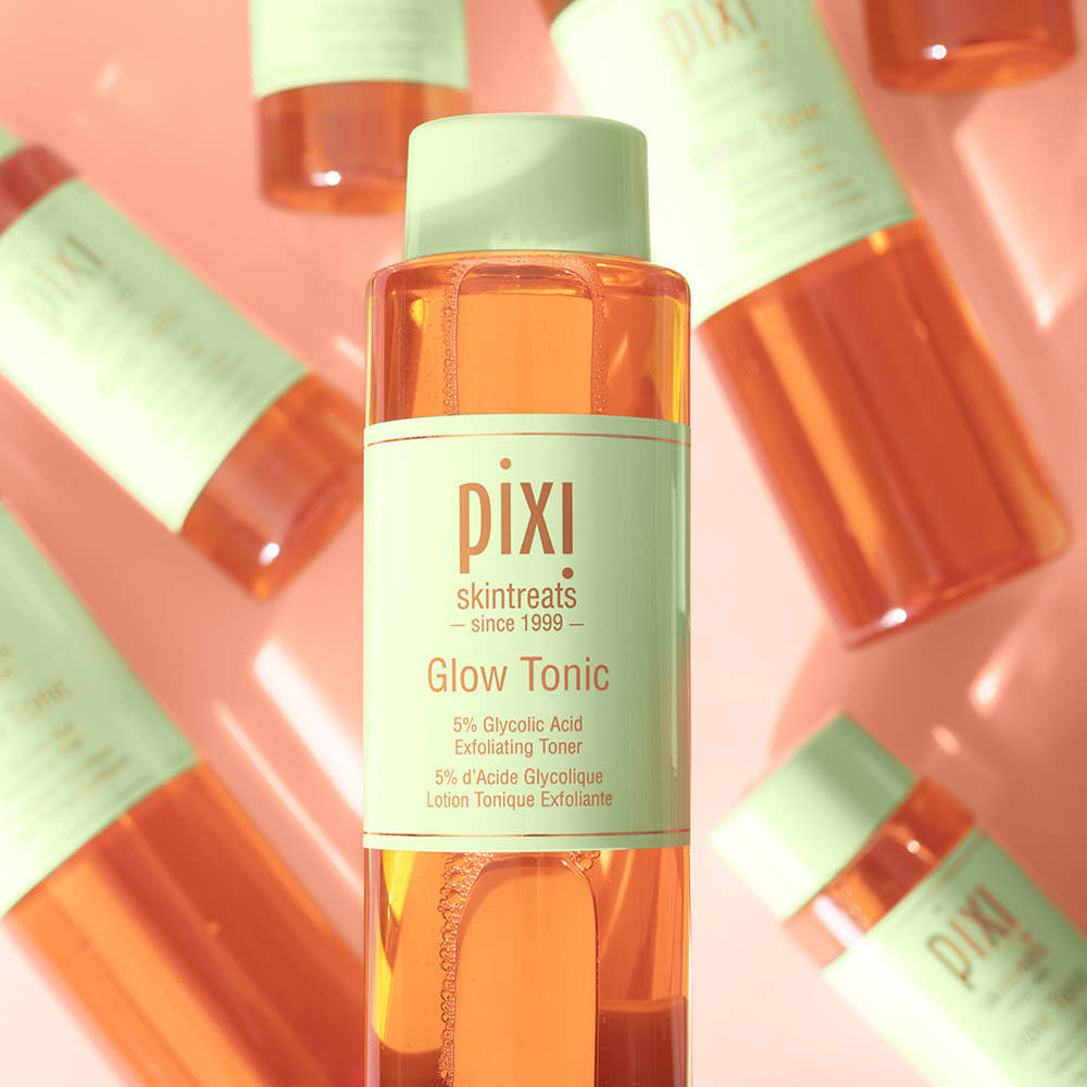 Glow Tonic 250ml product packaging includes several products in the background.